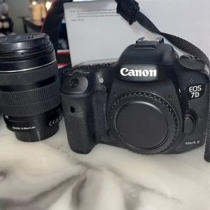Canon 7D mark II DSLR camera with 18-135 lens